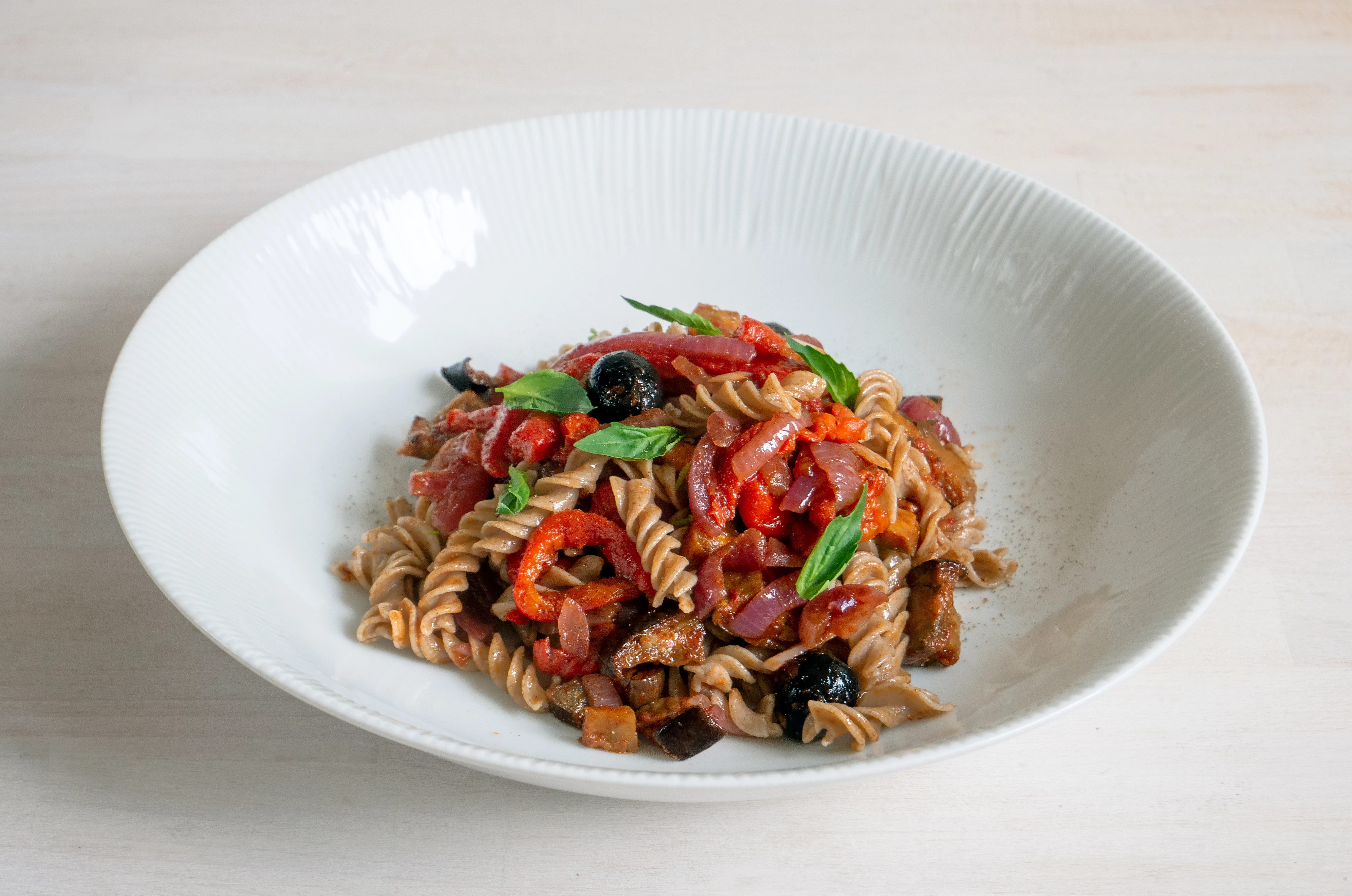 Recipe: Pasta with peppers, olives and spiced aubergine